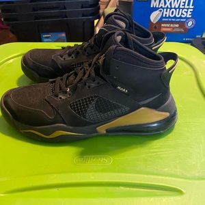 Men's Jordan Mars black and gold size 8.5.